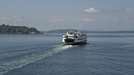 5K aerial stock footage tracking a passenger ferry sailing Elliott Bay, Seattle, Washington Aerial Stock Footage | AX45_045
