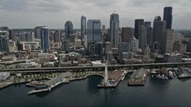 5K aerial stock footage approaching the skyline and Waterfront, and tilt down to the Great Wheel, Downtown Seattle, Washington Aerial Stock Footage | AX45_049