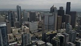 5K aerial stock footage flying over skyscrapers and high-rises to approach Rainier Tower, Downtown Seattle, Washington Aerial Stock Footage | AX45_075