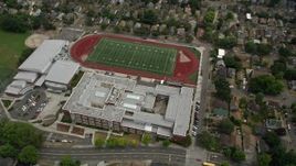 5K aerial stock footage of a bird's eye view of Garfield High School and football field, Central Seattle, Washington Aerial Stock Footage | AX45_079
