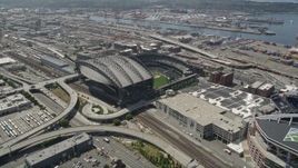 5K aerial stock footage approaching Safeco Field, tilting to bird's eye of baseball field, Downtown Seattle, Washington Aerial Stock Footage | AX45_093
