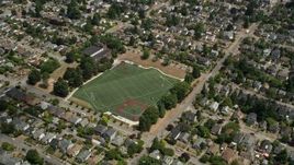 5K aerial stock footage flyby a sports field in a suburban area, Ballard, Washington Aerial Stock Footage | AX45_110