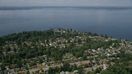 5K aerial stock footage flyby suburban homes by the shore of Puget Sound, Ballard, Washington Aerial Stock Footage | AX45_111E
