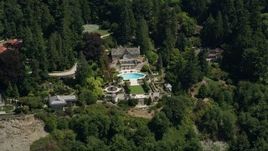 5K aerial stock footage flyby a mansion among trees, Shoreline, Washington Aerial Stock Footage | AX45_117