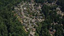 5K aerial stock footage pass by a suburban neighborhood and trees, Lynnwood, Washington Aerial Stock Footage | AX45_129
