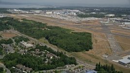 5K aerial stock footage approach the runways of Paine Field, and the Boeing Factory, Everett, Washington Aerial Stock Footage | AX45_130E