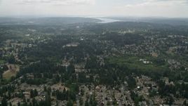 5K aerial stock footage fly over suburban neighborhoods with trees, Brier, Washington Aerial Stock Footage | AX46_011