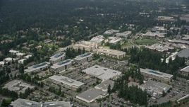 5K aerial stock footage flying by office buildings at Microsoft Headquarters campus, Redmond, Washington Aerial Stock Footage | AX46_031E