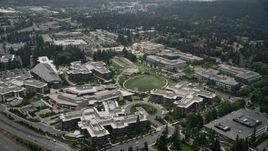 5K aerial stock footage orbiting office buildings around The Commons and a soccer field, Microsoft Headquarters, Redmond, Washington Aerial Stock Footage | AX46_034E