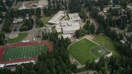 5K aerial stock footage flying by sports fields and Interlake High School, Bellevue, Washington Aerial Stock Footage | AX46_038