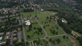 5K aerial stock footage tilting to a bird's eye view of a cemetery and funeral home,  Bellevue, Washington Aerial Stock Footage | AX46_042