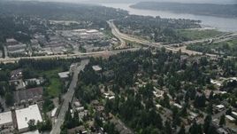 5K aerial stock footage tilt to suburban homes near a freeway interchange, Bellevue, Washington Aerial Stock Footage | AX46_043