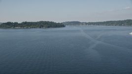5K aerial stock footage fly over Lake Washington to approach Mercer Island, Washington Aerial Stock Footage | AX47_003