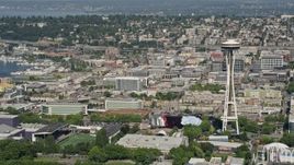 5K aerial stock footage of Memorial Stadium, Museum of Pop Culture, and the Space Needle in Downtown Seattle, Washington Aerial Stock Footage | AX47_049