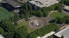 5K aerial stock footage of orbiting the Seattle Center Fountain; Downtown Seattle, Washington Aerial Stock Footage | AX47_052