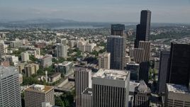 5K aerial stock footage fly over Downtown Seattle, and tilt to reveal an intersection beside the Seattle Public Library, Washington Aerial Stock Footage | AX47_055E