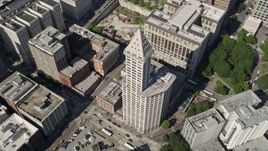 5K aerial stock footage of an orbit of Smith Tower in Downtown Seattle, Washington Aerial Stock Footage | AX47_058E