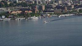 5K aerial stock footage of tracking a seaplane taking off from Lake Union, Seattle, Washington Aerial Stock Footage | AX47_069E