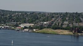 5K aerial stock footage of tracking a seaplane and revealing Fremont Cut, Queen Anne, Washington Aerial Stock Footage | AX47_071