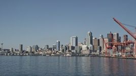 5K aerial stock footage fly low and approach the Downtown Seattle skyline and Central Waterfront, Washington Aerial Stock Footage | AX47_106