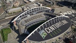 5K aerial stock footage approach CenturyLink Field and tilt to a bird's eye view of the field, Downtown Seattle, Washington Aerial Stock Footage | AX47_139