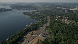 5K aerial stock footage flyby I-405 through a lakeside residential area on the shore of Lake Washington, Bellevue, Washington Aerial Stock Footage | AX48_007