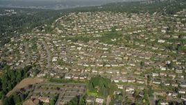 5K aerial stock footage of flying over rows of suburban tract homes in Bellevue, Washington Aerial Stock Footage | AX48_009E