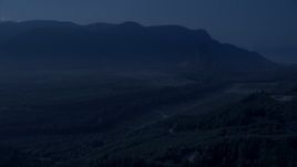4K day for night color corrected aerial stock footage of a forest road through newer forest growth area near the Cascade Range, King County, Washington Aerial Stock Footage | AX48_067_DFN