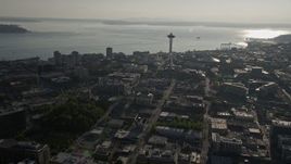 5K aerial stock footage approach the world famous Space Needle in Downtown Seattle, Washington, with Elliott Bay in the background Aerial Stock Footage | AX49_060