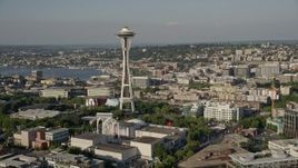 5K aerial stock footage approach the Space Needle and Seattle Center from Elliott Bay, orbit to reveal Downtown Seattle, Washington Aerial Stock Footage | AX49_070E