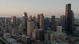 5K aerial stock footage orbit skyscrapers on the south side of Downtown Seattle, Washington, sunset Aerial Stock Footage | AX50_024