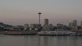 5K aerial stock footage of the Seattle Space Needle and Waterfront piers in Downtown Seattle, Washington, sunset Aerial Stock Footage | AX50_048
