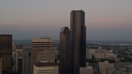 5K aerial stock footage of approaching the Columbia Center skyscraper in Downtown Seattle, Washington, sunset Aerial Stock Footage | AX50_051