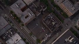 5K aerial stock footage of bird's eye view of city streets and office Building, Downtown Seattle, Washington, sunset Aerial Stock Footage | AX50_061