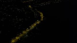5K aerial stock footage tilt to Rainer Avenue with light traffic in Lakeridge, Washington, night Aerial Stock Footage | AX51_002