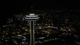 5K aerial stock footage orbit top of the Seattle Space Needle at night, Downtown Seattle, Washington Aerial Stock Footage | AX51_028E
