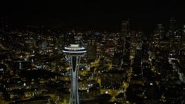 5K aerial stock footage orbit the Space Needle and reveal Downtown Seattle skyscrapers in Washington at night Aerial Stock Footage | AX51_030