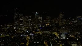 5K aerial stock footage flyby and approach Downtown Seattle skyscrapers and high-rises at night, Washington Aerial Stock Footage | AX51_036E