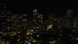 5K aerial stock footage approach Downtown Seattle skyscrapers and high-rises at night, Washington Aerial Stock Footage | AX51_037