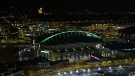 5K aerial stock footage of CenturyLink Field football stadium in Downtown Seattle, Washington, night Aerial Stock Footage | AX51_042