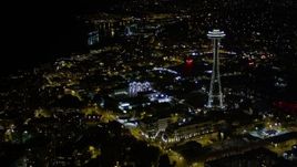 5K aerial stock footage approach and orbit Pacific Science Center and the Space Needle, Downtown Seattle, Washington, night Aerial Stock Footage | AX51_053E