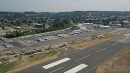 5K aerial stock footage of lifting off from Renton Municipal Airport, Washington Aerial Stock Footage | AX52_001E