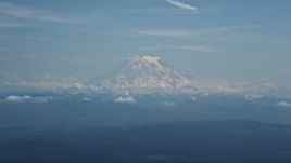 5K aerial stock footage of Mount Rainier with snow, Cascade Range, Washington Aerial Stock Footage | AX52_003