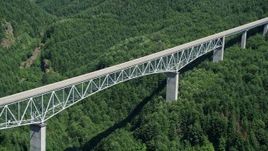 5K aerial stock footage approach the Spirit Lake Highway bridge with forest below; Cowlitz County, Washington Aerial Stock Footage | AX52_027