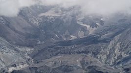 5K aerial stock footage of a close-up look inside the Mount St. Helens crater with low clouds, Washington Aerial Stock Footage | AX52_048