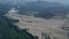 5K aerial stock footage approach the North Fork Toutle River sediment flow in Washington Aerial Stock Footage | AX52_053