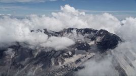 5K aerial stock footage of Mount St. Helens crater ringed by cloud coverage, Washington Aerial Stock Footage | AX52_061