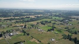 5K aerial stock footage fly over small farms and farm fields in Ridgefield, Washington Aerial Stock Footage | AX52_085