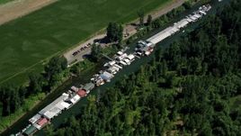 5K aerial stock footage of bird's eye view of a row of warehouse buildings on Lake River, Vancouver, Washington Aerial Stock Footage | AX52_096E