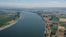 5K aerial stock footage of Columbia River between Washington and Riverview, Oregon farmland Aerial Stock Footage | AX52_098E